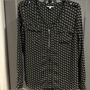Candie's black and white patterned long-sleeve blouse